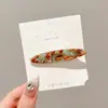 Pinza única y elegante para flequillo para mujer, diseño floral sencillo, nuevo modelo 2026, accesorio para el cabello dulce y genial de alto valor