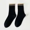 Calcetines para hombre y mujer de color sólido calcetines de tubo de algodón Joker medias a rayas deportes ocio deportes calcetines de moda algodón venta al por mayor