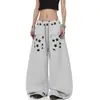 Exclusivo para ventas transfronterizas: Diseño de uso inverso estilo americano, pantalones de chándal unisex para danza jazz, pierna ancha, con cordón y estampado de estrellas, dobladillo curvo