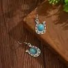 Pendientes de aleación retro con forma de U de estilo bohemio, de venta caliente transfronteriza europea y americana, pendientes étnicos con incrustaciones de turquesa para mujer