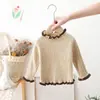 Ropa Interior de Punto para Niñas Blanca Nuevo Estilo 2025 Ropa Interior de Punto para Bebés y Niños Pequeños Suéter de Punto de Cuello Medio para Bebé Otoño e Invierno