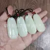 Venta al por mayor de fábrica colgante de Guanyin de jade afgano natural imitación de jade Hetian material de Qinghai color agua clara Guanyin de jade para hombre