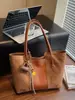 Bolso de mano grande retro para otoño e invierno para mujer, de alta gama y ligero, bolso de hombro elegante con gran capacidad, 2026 transfronterizo