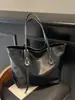 Bolsa tote de gran capacidad con un toque de alta gama para el trabajo y los desplazamientos, nuevo 2026, bolso de hombro versátil, moderno y sencillo para mujer