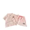 Conjunto de Dos Piezas para Niña de Verano 2026, Nuevo y Elegante, con Cuello Polo, Lindo Top de Manga Corta y Shorts/Falda, de Moda
