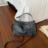 Bolsa Saco Texturizada Nova Primavera 2026, Fashion e Tendência, Bolsa de Mão Casual Única, Bolsa de Ombro e Transversal Feminina