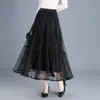 Falda de pastel con retazos de malla, falda midi acampanada para mujer, nuevo estilo primavera y otoño 2026, falda midi plisada de cintura alta elástica