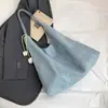 Bolsa Tote Jeans Estilo Preguiçoso Feminina Lançamento Primavera 2026 Grande Capacidade Ombro Único Bolsa de Axila Bolsa para Aula e Trajeto de Estudante