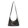 Yue Zi 2026 Novo Outono Alto Padrão Sensação Feminino Para o Trabalho Elegante Couro Macio Versátil Bolsa Dumpling Grande Capacidade Bolsa Transversal