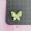 Accesorios de resina de mariposa de cinco colores pasador para el pelo funda de teléfono llavero adornos materiales de accesorios coloridos accesorios hechos a mano