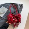 Bolsa de Ombro Sweet Cool Spice Girl de Alto Valor Feminina 2025 Verão Nova Moda Bolsa de Rebites Distinta Bolsa de Axila com Laço