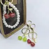 Llavero de Cereza de Moda Retro Europeo y Americano Más Vendido Transfronterizo con un Toque de Alta Gama, Accesorio Colgante de Fruta de Cereza para Bolsa
