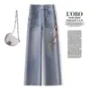 Calça Jeans Bordada Floral Estilo Nacional para Mulheres 2026 Novo Verão Emagrecedora Cintura Alta Solta Skinny Flare