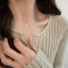 Collar de lazo con perlas y baño de oro real, cadena para la clavícula versátil de nicho para el día a día, joyería de moda y de alta gama para mujer