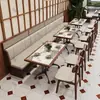 Restaurante estilo retro mesa y sillas de restaurante tejidas de ratán mesa de comedor redonda personalizada para recepción de lobby de hotel silla de ratán sofá cabina venta al por mayor