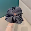 Scrunchie de Satén Nuevo Verano 2026 Versátil Gama Alta Color Sólido Simple Elegante Accesorio para el Cabello tipo Falda
