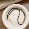 Colar de Pedra Olho de Tigre Retrô Outono e Inverno Corrente para Suéter Maillard de Alta Qualidade para Mulheres Corrente de Clavícula Versátil Acessível Luxo de Nicho Pingente