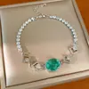Pulsera ovalada hueca de circonita a la moda y versátil, pulsera de nicho de lujo ligero, joyería de alta gama única y elegante al por mayor