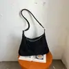 2026 Nueva Bolsa Coreana de Nicho Minimalista Textura Suave Forma de Empanadilla para Debajo del Brazo Bolsa de Hombro Única para Viajar Bolsa Cruzada