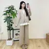Traje para mujeres embarazadas 2024 otoño e invierno nuevo moda coreana temperamento perezoso dos piezas falsas chaqueta de punto pantalones de pierna ancha tendencia