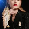 Broche de Pluma Dorado Champagne de Cristal, Gama Alta, Elegante, Lujo Ligero, Nuevo Estilo 2025 Corsage, Accesorio de Pin Anti-Exposición