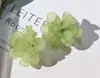 Brincos doces e elegantes, brincos versáteis de nicho de alta qualidade estilo francês, brincos de florzinha estilo fada, cor verde popular