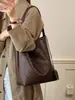Bolso de mano tejido con patrón transfronterizo para mujer, nuevo bolso de hombro único de nicho 2026 para mujer, bolsa de mano tote vintage versátil de gran capacidad