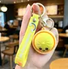 Nuevo llavero de panecillo lindo de venta caliente transfronterizo con expresión, colgante de juguete de peluche, decoración para mochila de estudiante, regalo