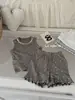 87018 Conjunto de Ropa de Casa para Niñas 2026 Nuevo Estilo Principios de Primavera Conjunto de Dos Piezas de Chaleco y Shorts para Bebé Tejido Transpirable y Absorbente