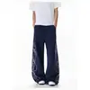 Pantalones casuales bordados con letras estilo retro americano para hombre, nuevo estilo 2026, cintura elástica deportiva, corte holgado, marca de moda, pantalones largos versátiles