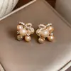 Brincos de Tarraxa Pérola com Zircônia Cúbica Agulha de Prata Estilo Doce Fresco Design Exquisito Brincos Novo Estilo 2026 Adornos de Orelha Atacado Mulheres