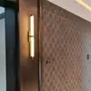 Lámpara de pared minimalista y lujosa para mesita de noche, con un toque de alta gama, adecuada para hoteles, clubes, vestíbulos, pasillos y paredes de fondo, con elementos de tela