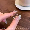 Estilo Coreano Tendencia Sentido del Diseño Forma de C Rombo Círculo Triángulo Ola Micro-pavimentado Circonita Geométrico Pendientes de Tachuela Moda Clips para Orejas