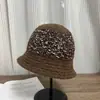 Sombrero de pescador tejido con diseño de patchwork, nuevo estilo coreano otoño/invierno 2026, versátil, favorecedor del rostro, moderno y elegante sombrero de cubo
