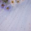 Fondo fotográfico de malla con forma de estrella y luna, ideal para joyería, decoración de uñas y accesorios a juego.