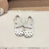 Zapatos de piel para niña 2026 nuevo modelo lindos zapatos de princesa de suela blanda con lunares, correas elásticas cruzadas y lazo de cinta, zapatos para niños