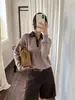 Han Xun Suéter Clásico Retro Universitario de Lana Terciopelo Suave Adelgazante Bloque de Color Cuello Polo para Mujer Colección Otoño 2026 27497