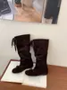 []2026 novas botas femininas de cadarço com laço, botas longas de bico redondo, botas de camurça emagrecedoras da moda