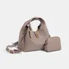 Bolsa de Mão para o Trabalho Primavera Verão 2026 Bolsa de Mão Feminina Simples Primavera Verão Nova Moda Bolsa Saco com Toque de Luxo Bolsa de Ombro Único Transversal