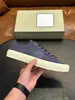 Zapatillas casuales de lona y cuero genuino con retazos de corte bajo para hombre, estilo transfronterizo TF, ribete de cuero gris, suela blanco roto