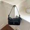 Nuevo bolso de hombro elegante para el día a día de Shuai Mi, bolso cruzado de nicho estilo motero, bolso de axila moderno y a la moda