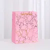 Bolsa de compras al por mayor con patrón geométrico, bolsa de mano estampada, bolsa para empaquetar dulces de fiesta, bolsa de regalo, bolsa de cartón blanco con bronceado