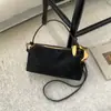 2025 Nova Bolsa de Mão de Alta Qualidade com Textura, Moda Versátil, Tendência, Nicho para Mulheres, Bolsa de Ombro Simples Casual, Bolsa Transversal