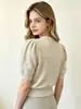 Venta al por mayor transfronteriza desde la fábrica de origen: Suéter de punto para mujer de otoño e invierno con mangas abullonadas en forma de estrella, mangas desmontables, suéter corto de cuello redondo