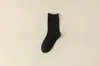 Nuevos Calcetines Holgados de Color Sólido Otoño e Invierno Calcetines de Maternidad Calcetines Transpirables de Media Pantorrilla para Mujer Tendencia Simple Calcetines Zhuji Venta al por Mayor