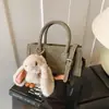 Bolsa Quadrada Pequena de Design de Nicho Transfronteiriça Novo Estilo Outono e Inverno Bolsa de Ombro Casual Versátil Bolsa Transversal Moda Pequena Bolsa