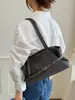 Bolsa de Ombro Coreana de Nicho Feminina 2026 Nova Tendência Moda Estilo Motociclista Bolsa Tote Simples de Grande Capacidade para o Dia a Dia