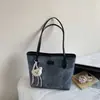 Bolsa Tote Casual da Moda de Grande Capacidade para Mulheres 2025 Outono Novo Estilo Bolsa de Ombro Simples e Estilosa para Trabalho e Deslocamento Bolsa Feminina