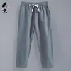 Pantalones cortos de lino de verano para hombre, pantalones casuales rectos y sueltos para hombre, pantalones cortos finos y cortos, pantalones juveniles de moda.