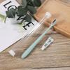 Fornecimento de fábrica amor plástico macio adulto carvão de bambu escova de dentes cerdas macias 3 gramas pasta de dente PVC cilindro transparente atacado